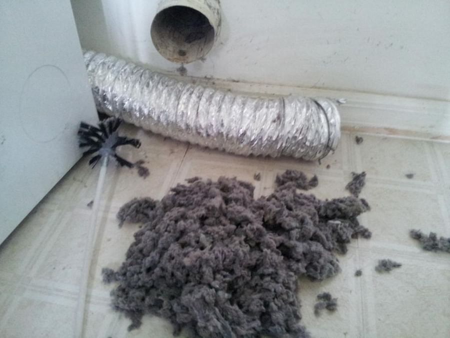 Image of a heavily clogged dryer vent