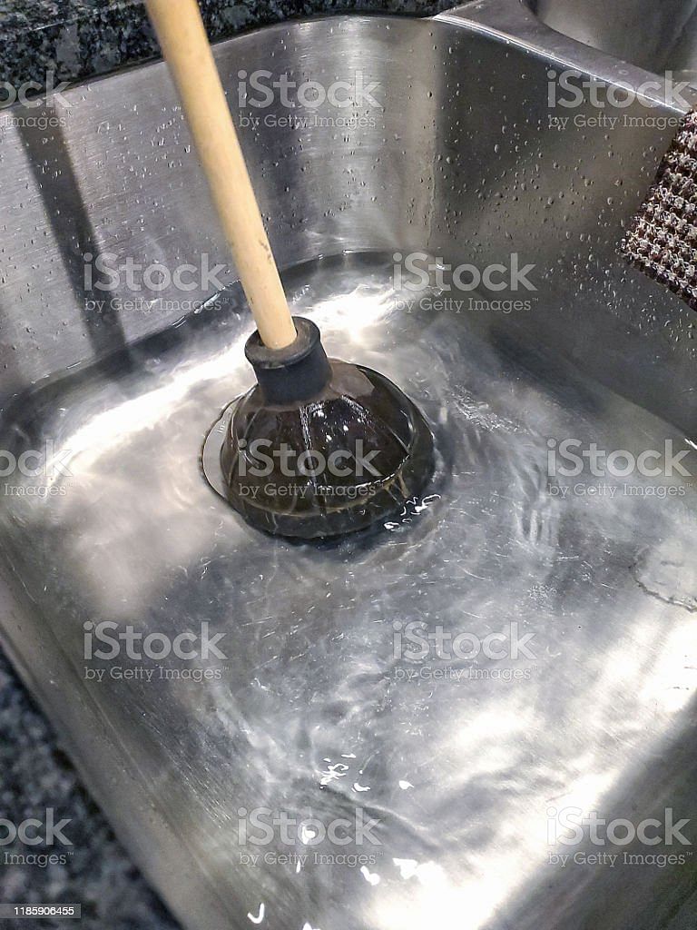 plunger unclogging kitchen sink