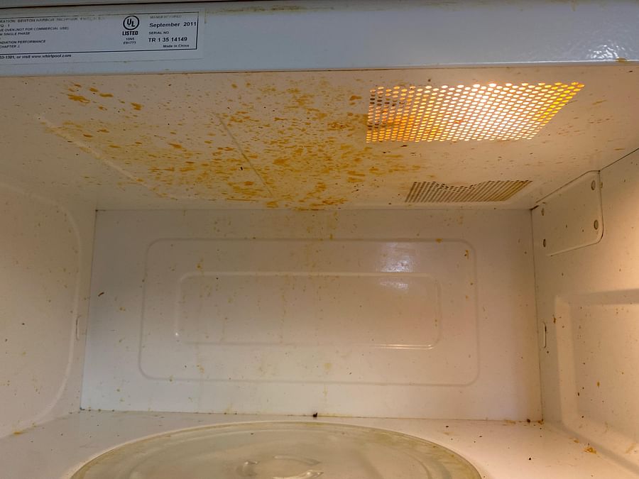 Dirty microwave interior view